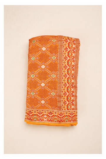 Vibrant Mustard Yellow Patola Print Silk Blend Saree With Traditional Geometric Border