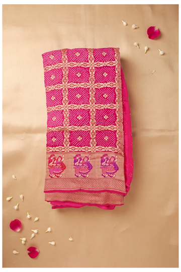 Elegant Rani Pink Bandhani Saree With Zari Checkered Pattern And Traditional Figurine Border
