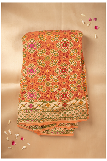 Elegant Orange Patola Style Printed Georgette Saree With Zari Border