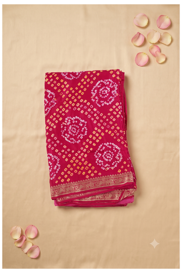 Elegant Magenta Pink Bandhani Saree With Golden Zari Elephant Border