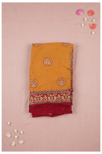 Elegant Mustard Yellow Georgette Saree With Circular Embroidered Motifs And Contrast Red Border