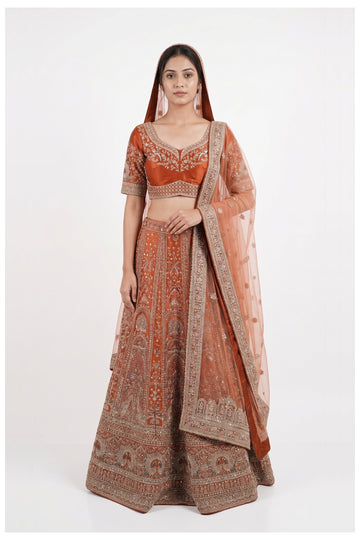 Rust Orange Embroidered Bridal Lehenga Choli With Net Dupatta