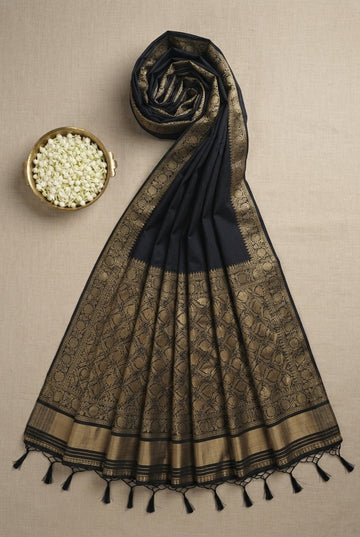 Elegant Black Cotton Silk Saree With Ornate Golden Zari Border And Tassels