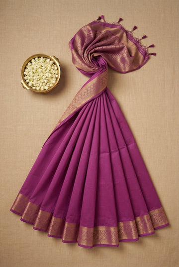 Elegant Magenta Silk Cotton Saree With Traditional Golden Zari Border And Tassels