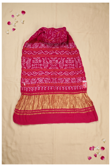 Traditional Rani Pink Bandhani Saree With Exquisite Figural Motifs And Golden Zari Border