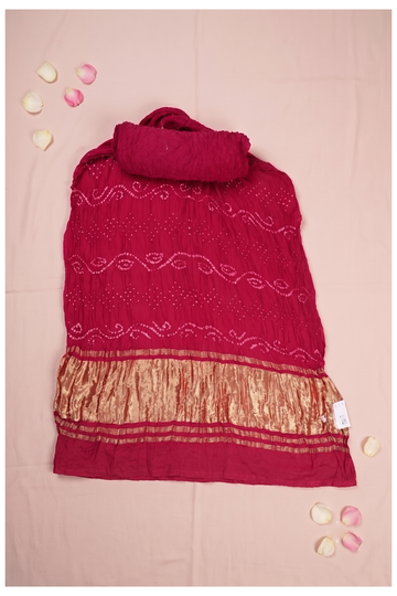 Elegant Magenta Bandhani Crushed Georgette Saree With Golden Zari Border