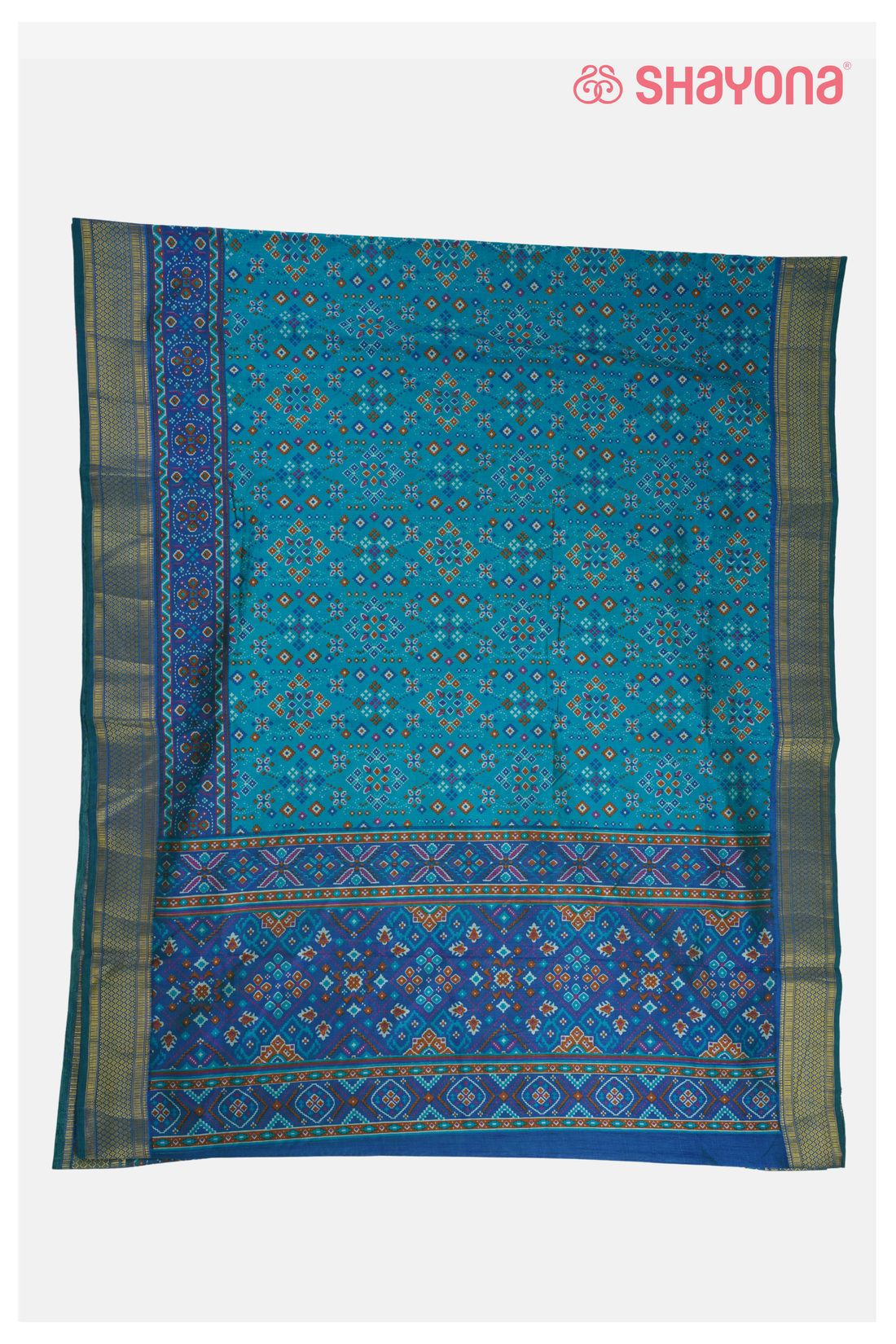 Glossy Teal Printed Patola Cotton Saree