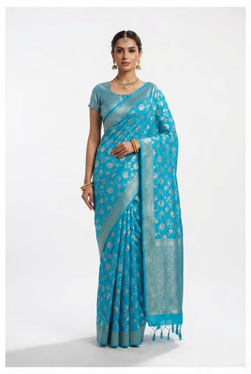 Elegant Turquoise Blue Banarasi Silk Saree With Silver Zari Floral Motifs