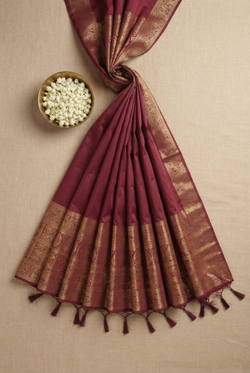 Elegant Maroon Banarasi Silk Saree With Intricate Golden Zari Border