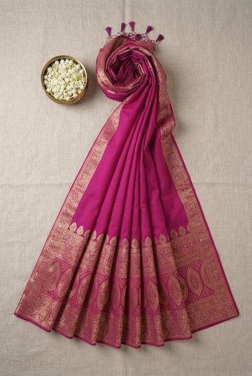 Elegant Magenta Silk Saree With Ornate Golden Zari Border And Pallu Tassels
