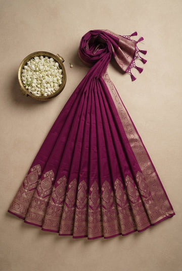 Elegant Magenta Silk Blend Saree With Gold Zari Border And Tassels