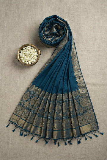 Elegant Teal Blue Banarasi Silk Saree With Intricate Gold Zari Border