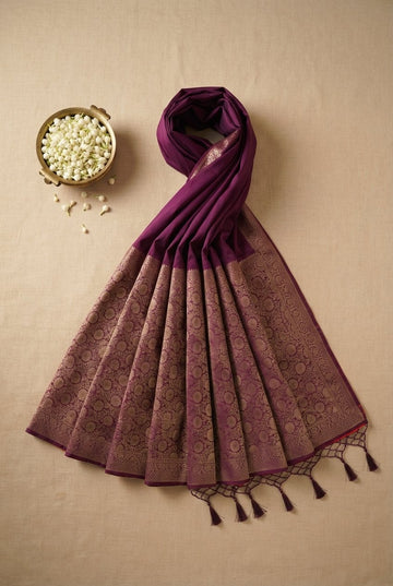 Elegant Deep Plum Silk Saree With Antique Gold Zari Border And Tassels