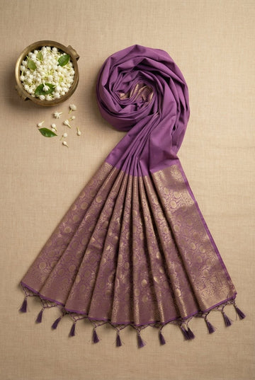 Elegant Purple Linen Blend Saree With Golden Zari Border And Tasseled Pallu