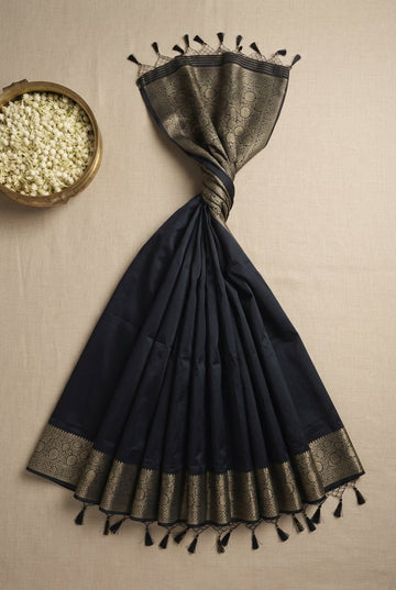 Elegant Jet Black Silk Cotton Saree With Antique Gold Zari Border And Tassels