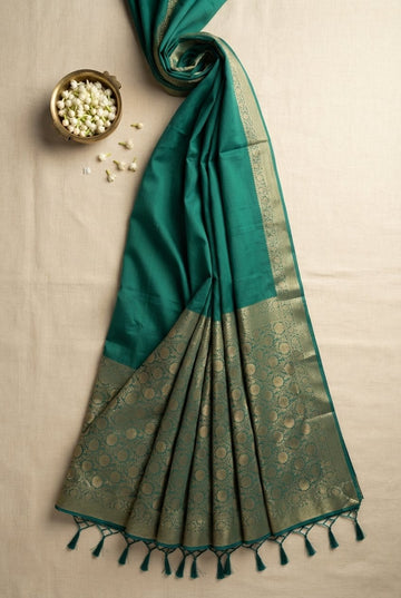 Elegant Teal Green Banarasi Silk Saree With Antique Golden Zari Border