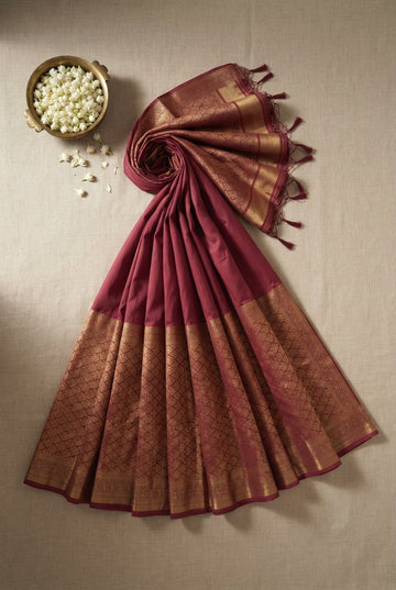 Elegant Dusty Rose Cotton Silk Saree With Antique Gold Zari Border And Tassels