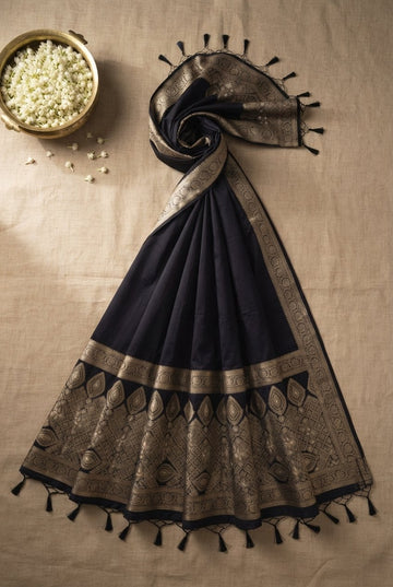 Elegant Black Handloom Cotton Silk Saree With Antique Gold Zari Border And Tassels