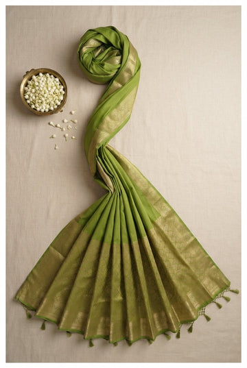 Elegant Leaf Green Silk Cotton Saree With Traditional Golden Zari Border And Tassels