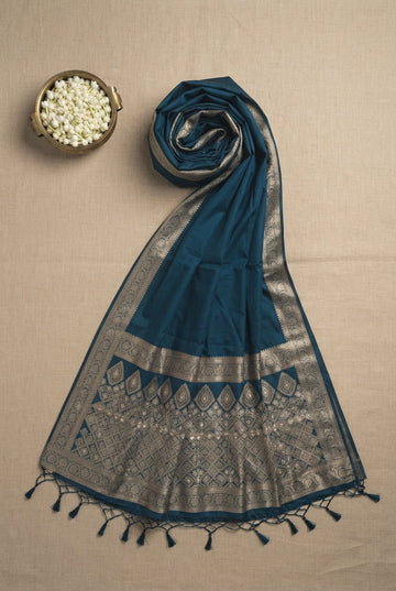 Elegant Teal Blue Silk Blend Saree With Rich Zari Border And Hand-Knotted Tassels