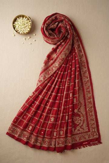 Elegant Deep Red Georgette Saree With Intricate Gold Zari Grid And Ornate Border