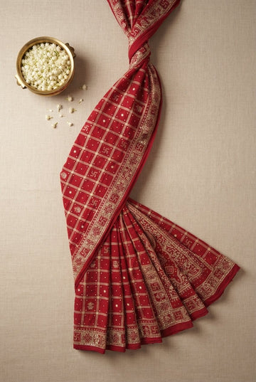 Traditional Crimson Red Saree With Gold Zari Grid And Auspicious Motifs