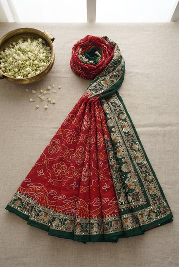 Traditional Red And Green Bandhani Georgette Saree With Embroidered Zari Border