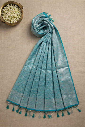 Turquoise Blue Banarasi Soft Silk Saree With Intricate Silver Zari Weaving