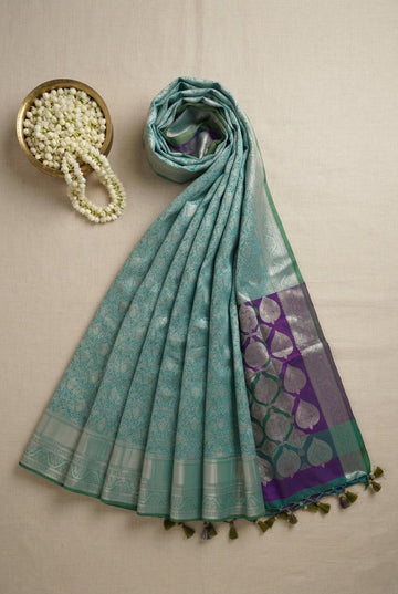 Elegant Sea Green Kanchipuram Silk Saree With Contrasting Purple Pallu