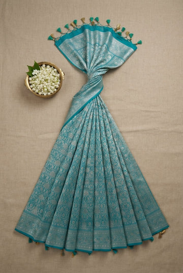 Elegant Teal Blue Banarasi Silk Saree With Rich Silver Zari Jaal Work