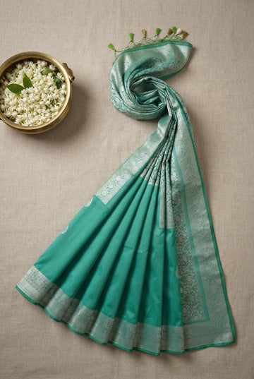 Elegant Turquoise Green Banarasi Katan Silk Saree With Silver Zari