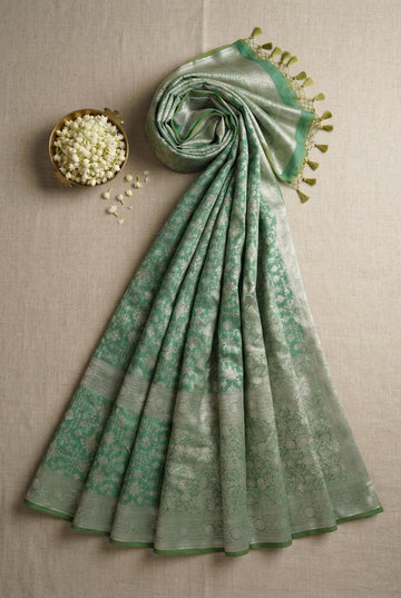 Sage Green Banarasi Silk Saree With Elegant Silver Zari Floral Jaal And Tassels
