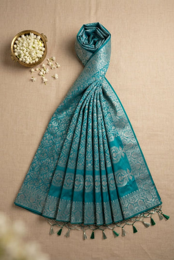 Teal Blue Banarasi Katan Silk Saree With Elegant Silver Zari Brocade