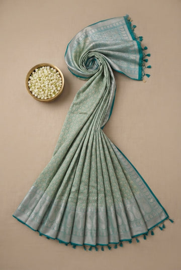 Elegant Mint Green Handwoven Kanjeevaram Silk Saree With Silver Zari Border