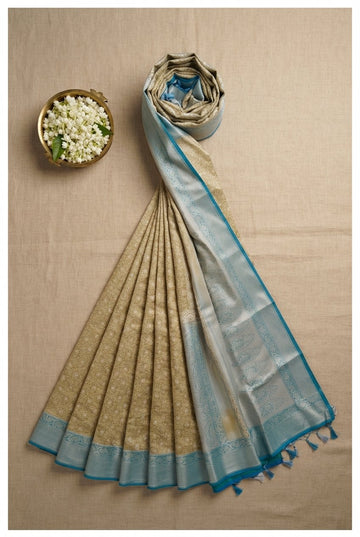 Elegant Beige And Turquoise Blue Banarasi Silk Saree With Silver Zari Border