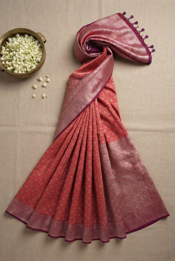Exquisite Coral Red And Purple Banarasi Silk Saree With Silver Zari