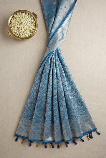 Azure Blue Banarasi Silk Saree With Intricate Silver Zari Floral Jaal Weave