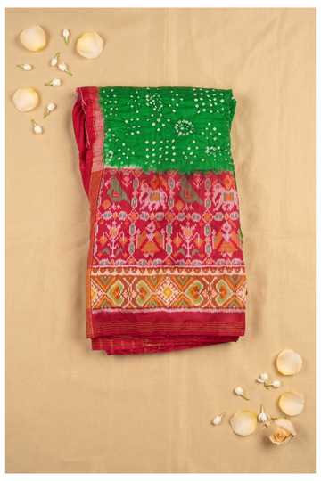 Elegant Green Bandhani Silk Saree With Traditional Red Patola Ikat Border