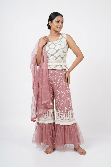 Elegant Blush Pink Sharara Set With Embroidered Peplum Top & Dupatta