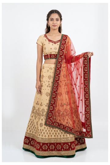 Cream Embroidered Lehenga Choli With Red Net Dupatta