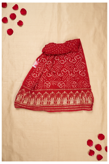 Elegant Crimson Red Bandhani Saree With Exquisite Golden Zari Figure Border