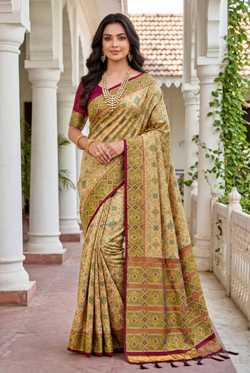 Cream Beige Patola Art Silk Saree With Elegant All Over Jaal And Olive Heritage Woven Border
