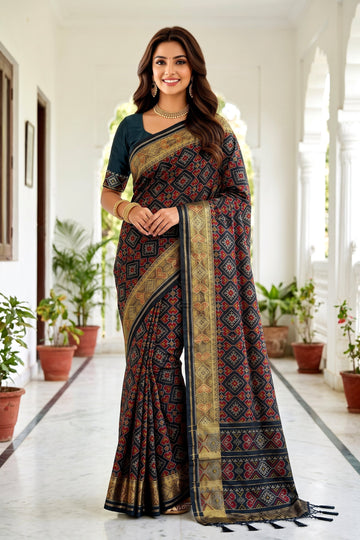 Charcoal Black Patola Art Silk Saree With Heritage All Over Jaal And Antique Gold Woven Border